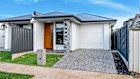 The three-bedroom, two-bathroom row dwelling/duplex at 89c Whitington Road in outer-northern Adelaide’s Davoren Park sold at auction for $730,000.