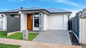 The three-bedroom, two-bathroom row dwelling/duplex at 89c Whitington Road in outer-northern Adelaide’s Davoren Park sold at auction for $730,000.