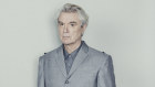 David Byrne's career has been bracketed by suits.