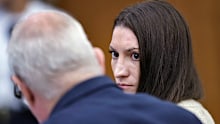Defendant Lindsay Clancy talks with her lawyer Kevin Reddington. during her murder trial