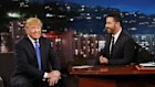 This photo provided by ABC shows guest Republican Presidential candidate Donald Trump, left, with host Jimmy Kimmel, on Jimmy Kimmel Live on Wednesday, Dec. 16, 2015, in Los Angeles. The ABC show airs every weeknight, 11:35 p.m. - 12:41 a.m., ET. (Randy Holmes/ABC via AP)