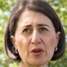 Gladys Berejiklian's clumsy week alarmed some of her most senior colleagues. Deputy Premier John Barilaro, pictured in the background, says the recent string of mistakes was "not the Gladys I know".