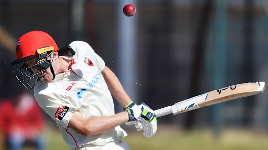 Liam Scott is hit by a bouncer.