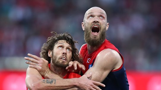 Sydney’s Tom Hickey and Melbourne’s Max Gawn only have eyes for the Sherrin.