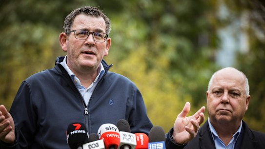 Premier Daniel Andrews and Treasurer Tim Pallas announcing the $380 million deal for cancelling the Commonwealth Games.