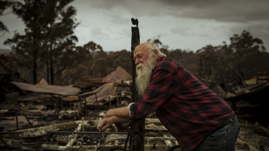 Brian Blakeman saved his Wairewa home, but the surrounding buildings were destroyed.