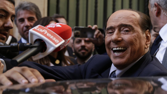 Silvio Berlusconi is mobbed by press as he leaves a reunion to decide the group leaders of at the Lower Chamber, in Rome.