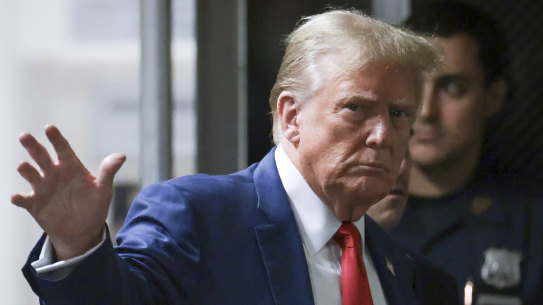 Former US president Donald Trump enter the Manhattan Criminal Court on Monday.