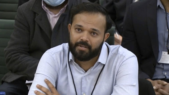 Former cricketer Azeem Rafiq gives evidence during a British parliamentary hearing.