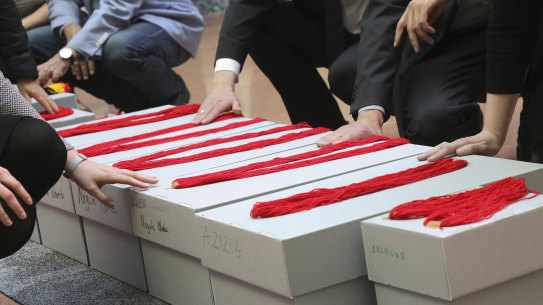 Invited guests participate in a ceremony to return the mortal remains of indigenous Australians, from the State Ethnographic collections at Martin Luther University in Germany.