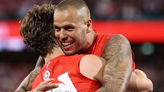 Lance Franklin and Dane Rampe celebrate after beating Collingwood by a point in Saturday night’s preliminary final.