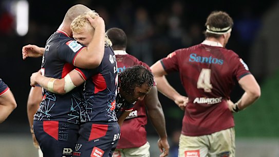 MELBOURNE, AUSTRALIA - MARCH 25: Carter Gordon of the Rebels and Cabous Eloff of the Rebels celebrate the win during the round five Super Rugby Pacific match between Melbourne Rebels and Queensland Reds at AAMI Park, on March 25, 2023, in Melbourne, Australia. (Photo by Kelly Defina/Getty Images)