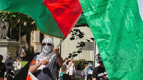 A pro-Palestinian protestor in Melbourne on October 13. 