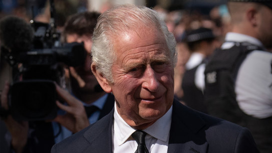 King Charles arriving at Buckingham Palace.