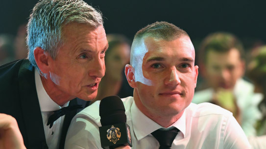 Let’s chat: Dustin Martin, seen here with broadcasting great Bruce McAvaney, has been a media recluse through his stellar career.