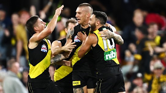 BRISBANE, AUSTRALIA - OCTOBER 24: Dustin Martin of the Tigers celebrates kicking a goal during the 2020 AFL Grand Final match between the Richmond Tigers and the Geelong Cats at The Gabba on October 24, 2020 in Brisbane, Australia. (Photo by Quinn Rooney/Getty Images)