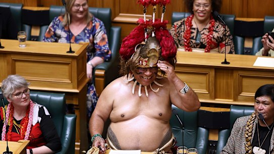 New Zealand outgoing minister for Pacific peoples, Aupito William Sio, arrives in traditional Samoan finery including a feathery headdress called a tuiga to deliver his final speech at parliament in Wellington on August 22.
