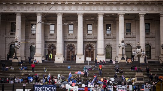 Protesters gather at Parliament House on Tuesday. 