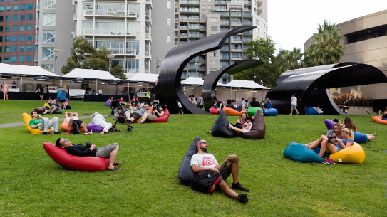 Carefree audience members take a break at Arts Centre Melbourne in the pre-COVID era.