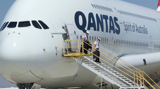 Qantas pilots leave an A380 after it was put into storage in California in July 2020.