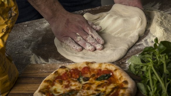 When stretching the pizza dough, try to do it like the pros, but it all tastes good.