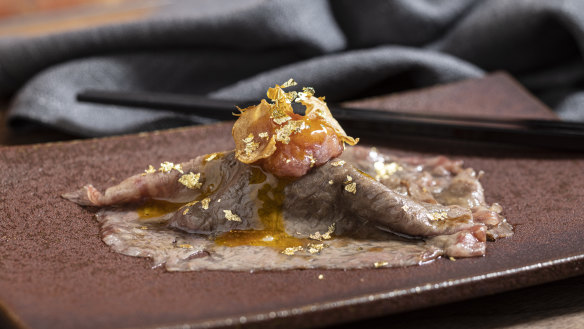 Surf and turf: Wagyu with minced tuna belly and gold leaf.