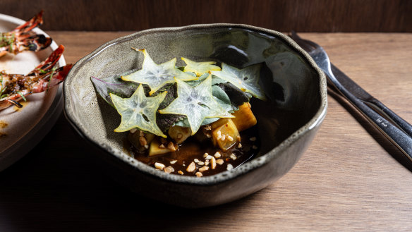 Rojak salad with papaya, pineapple, star fruit, sorrel and broad bean leaves, and macadamia.