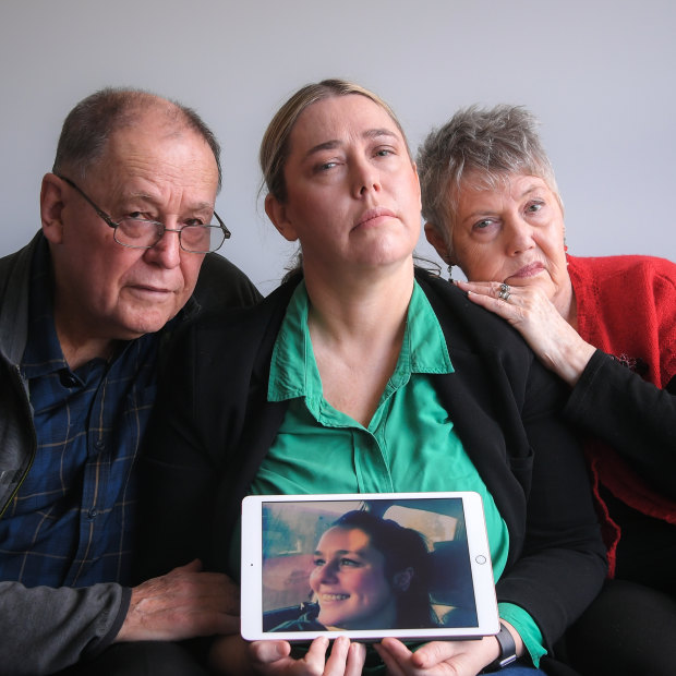 From Left: Lindsay, Vaness and Anne Byrnes with a photo of their daughter and sister, Rachael.
