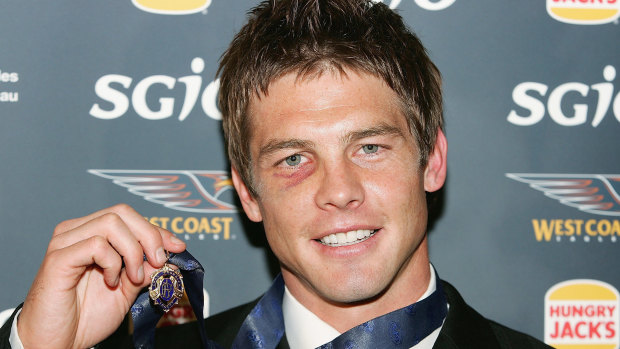 Ben Cousins of the Eagles poses with the 2005 Brownlow Medal after being announced as the winner.