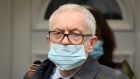 Jeremy Corbyn leaves home after learning of his suspension from the Labour Party.