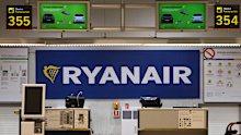 The man was pulled back inside the aircraft by fellow passengers after a window became dislodged.