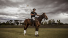 Tolga Kumova (pictured at his polo farm) is suing the owner of a social media account that accused him of insider trading. 