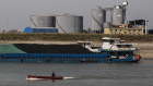 Barges laden with coal outside a coal-fired plant in central China.