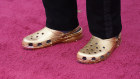 American musician Questlove in gold Crocs at the Oscars.