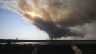 Thick plumes of heavy smoke fill the sky in Halifax, Nova Scotia.