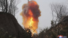 This photo provided by the North Korean government shows what it says is a ballistic missile being launched at the weekend.
