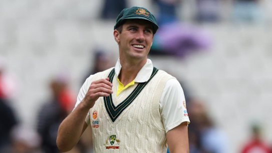 Australia’s Pat Cummins leads the Australian team off the field after victory at the MCG in the Boxing Day Test.