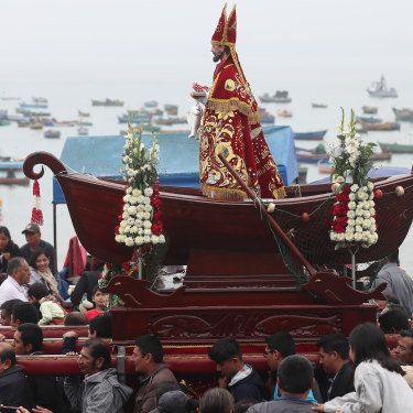 A Peruvian fishing community carries its patron saint during a Catholic celebration. In the 1600s, fishermen in Peru coined the term El Nino (“little boy” or Christ child”) to describe a weather event that left them low on seafood around Christmas time. 