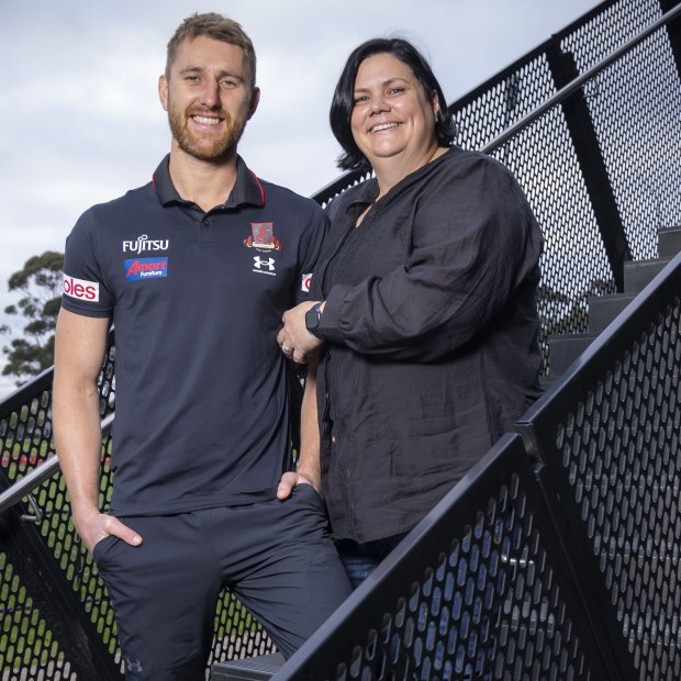 Dyson Heppell with Bobbie Lee Blay at Essendon’s base, ‘The Hangar’.