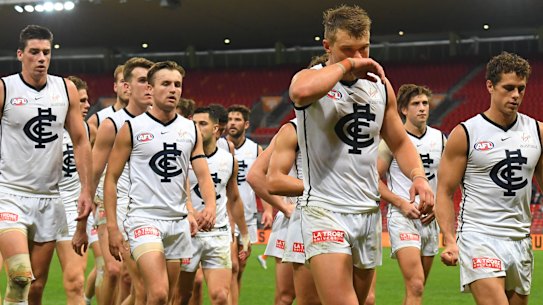 Carlton trudge off Giants Stadium after their latest humiliation on Sunday.