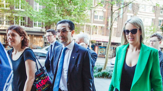 Dr Munjed Al Muderis (centre), with barrister Sue Chrysanthou, SC (left), and his partner Claudia Roberts.