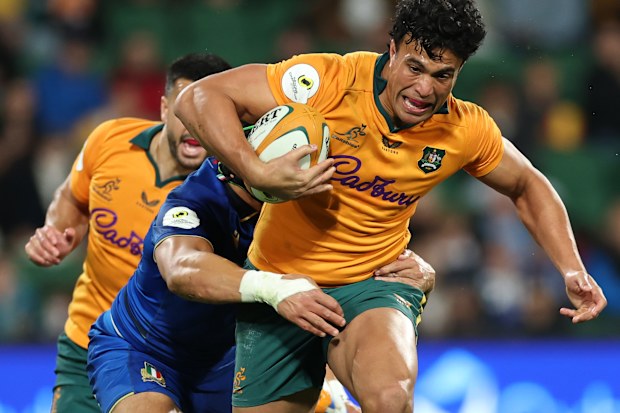 Joseph-Aukuso Suaalii runs the ball against Italy during the Nations Championship game at HBF Park in Perth.
