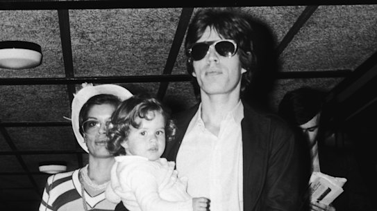 Rock star Mick Jagger with his wife Bianca and their daughter Jade, circa 1974.