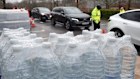 Bottled water being distributed to residents at Tunbridge Wells in south-east England because of water supply issues.
