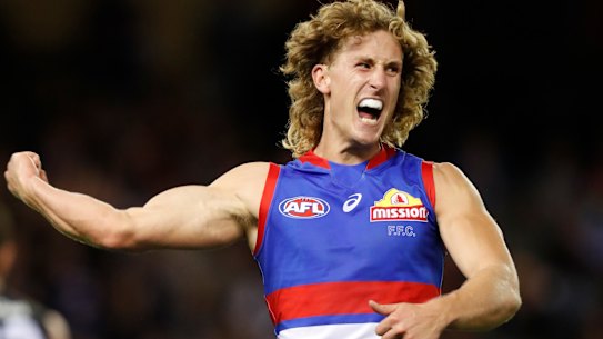 Aaron Naughton celebrates in style