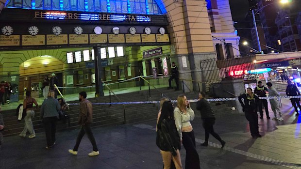 Police tape outside Flinders Street Station on Saturday night.