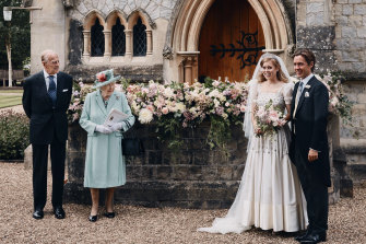 Two pictures were released by the royal family, neither featuring Prince Andrew, the bride's father.