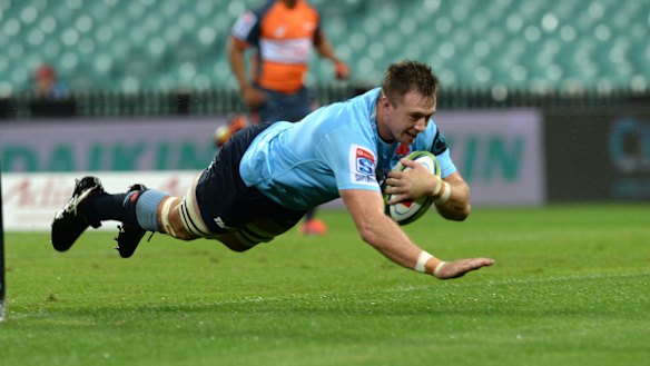 Right start: Jed Holloway goes over untouched for the home side.