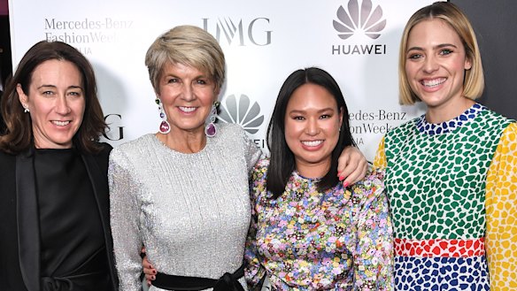 Julie alongside influential fashion folk.