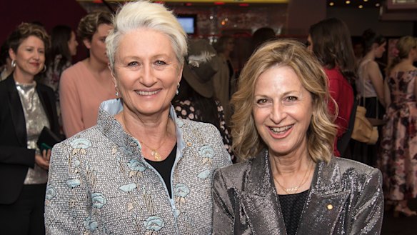 Kerryn Phelps and Jackie Stricker-Phelps say they have symptoms similar to long COVID after vaccine shots.